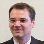 Photo of Uwe Schulze (links to LinkedIn profile)